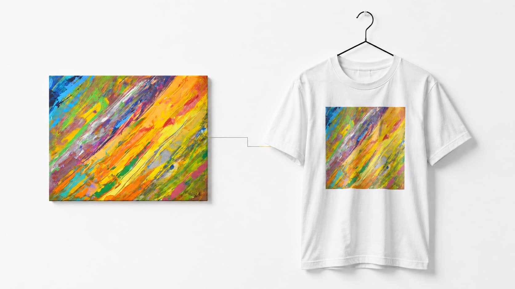 キャンバスに描かれた一枚の絵と、その絵を前面にプリントした白いTシャツ
